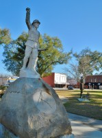 This statue of a WWI doughboy, with his arm outstretched, honors all of Headland's military dead. It stands at the center of Headland Public Square.