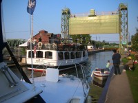 The Emita II passes through Lock 24 across from Paper Mill Island in downtown Baldwinsville.