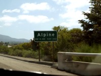 Alpine's town sign at its western border, as seen from I-8