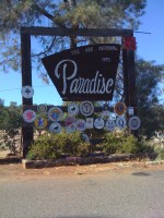 Welcome to Paradise sign on Clark road