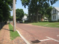 A brick road and sidewalk in a Sterling neighborhood near the Paul W. Dillon Home
