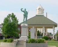 Town square in Lawrenceburg with a statue of David Crockett in the center.